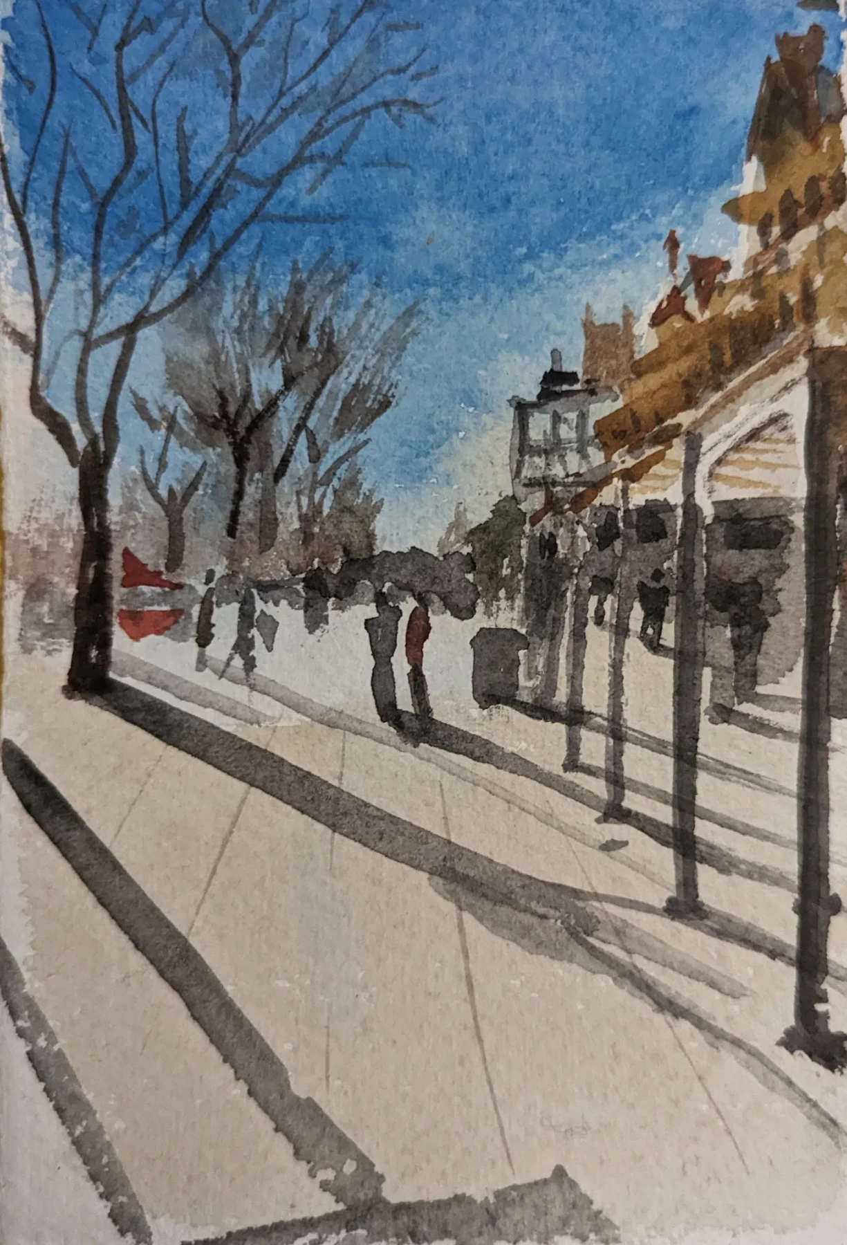 Ink and watercolour: Bare trees and pedestrians casting long shadows along a broad pavement in Southport.